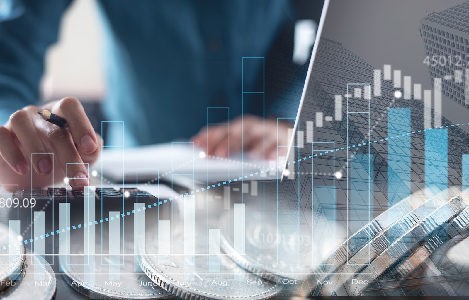 A bar chart graph is overlaid on an image of a mann using a laptop and a calculator.