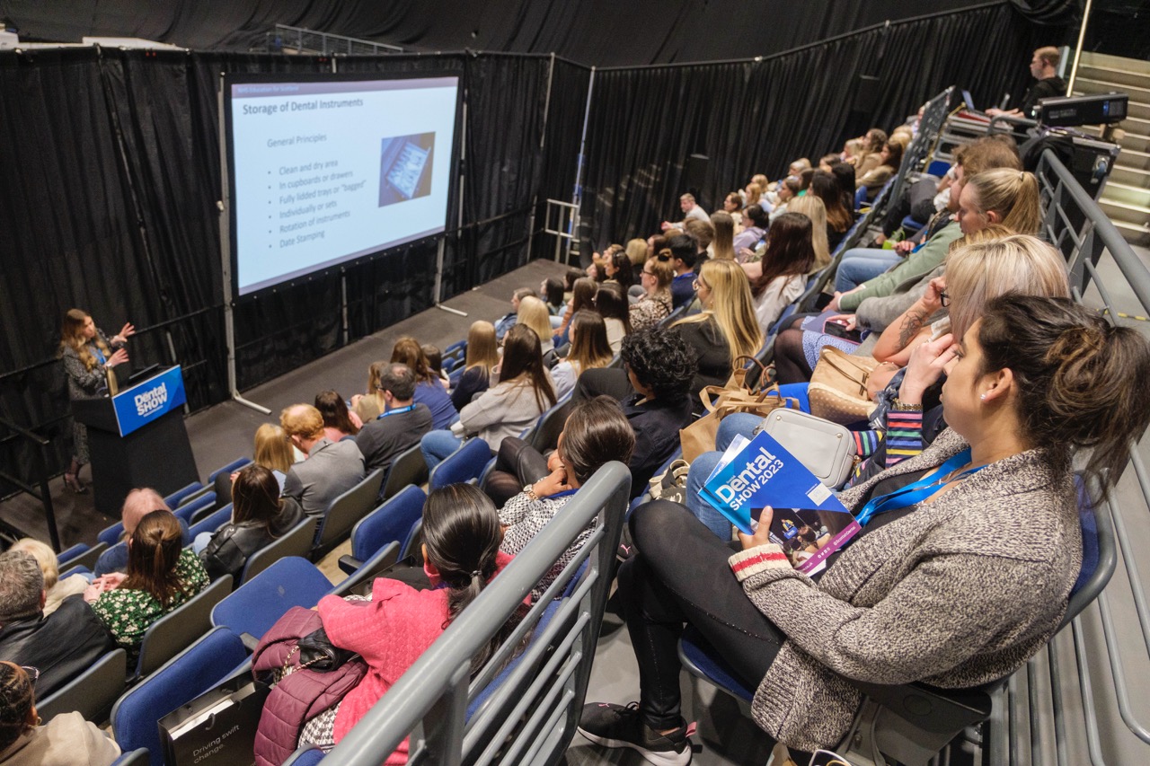 A speaker delivers a talk at the Scottish Dental Show 2023.