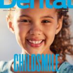 Cover of the April 2026 issue of Scottish Dental Magazine. An image of a young girl smiling at the camera under the words Childsmile