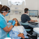 A dental nurse completes a charting exam