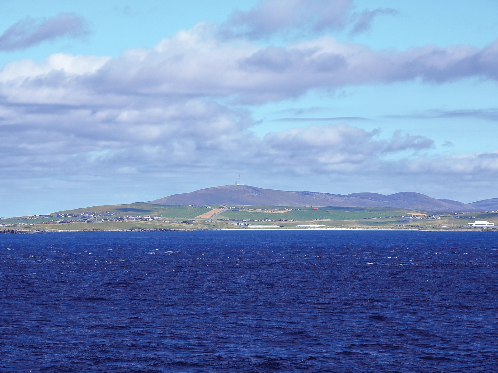 distant view to the south coast of the Shetland Islands